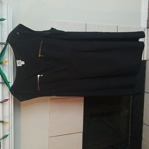 Simple black put on and go dress. Does not wrinkle